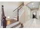 Elegant staircase with wood and white accents, connecting the home's two stories at 1254 W Browning Way, Chandler, AZ 85286