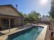 Sparkling backyard pool with a relaxing patio, perfect for outdoor enjoyment and entertaining at 1309 W Calle Del Norte --, Chandler, AZ 85224