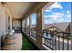 Outdoor balcony with artificial grass, outdoor decor and a nice view of the neighborhood at 1350 S Greenfield Rd # 2133, Mesa, AZ 85206
