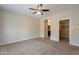 Large main bedroom with closet and access to the main bath at 15936 W Kino Dr, Surprise, AZ 85374