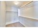 Spacious walk-in closet with ample shelving and rod space, ready for organization and storage at 16631 E El Lago Blvd # 208, Fountain Hills, AZ 85268