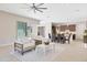 Open-concept living space with modern decor, comfortable seating, and an inviting atmosphere at 17183 W San Marcos St, Surprise, AZ 85388