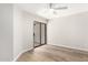 Bright bedroom with vinyl floors and a sliding door that leads to the backyard at 19820 N 13Th Ave # 175, Phoenix, AZ 85027