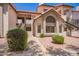 Beautiful condo building with lovely desert landscaping, private entrances, and tile roof at 19820 N 13Th Ave # 175, Phoenix, AZ 85027