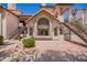 Charming condo exterior with large windows, terra cotta roof, and a desert-landscaped front yard at 19820 N 13Th Ave # 175, Phoenix, AZ 85027