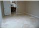 The tiled floors stretch through the rooms. The living room has brown seating at 2068 E Cairo Dr, Tempe, AZ 85282
