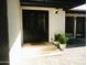 Inviting front entrance features a double door, well-maintained landscaping, and neutral stone pavers at 2068 E Cairo Dr, Tempe, AZ 85282