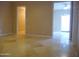 The tiled floor stretch through the rooms. The living room is through the door at 2068 E Cairo Dr, Tempe, AZ 85282