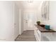 Bright entryway featuring wood floors and a decorative table at 2423 E Dahlia Dr, Phoenix, AZ 85032