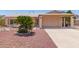 Single story home with desert landscaping and covered carport at 2423 E Dahlia Dr, Phoenix, AZ 85032