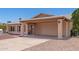 Single story home with a covered carport and desert landscaping at 2423 E Dahlia Dr, Phoenix, AZ 85032