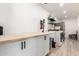 Functional laundry room featuring new appliances, a butcher block folding table, and lots of storage at 2423 E Dahlia Dr, Phoenix, AZ 85032