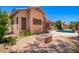 Backyard with fire pit, swimming pool, and patio at 25633 N 71St Dr, Peoria, AZ 85383
