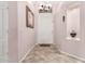 Welcoming foyer featuring neutral paint and tile floors at 25633 N 71St Dr, Peoria, AZ 85383