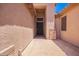 Covered entry featuring a paver walkway and neutral color scheme at 25633 N 71St Dr, Peoria, AZ 85383
