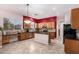 Spacious kitchen boasts granite countertops, stainless steel appliances, and ample cabinet space at 25633 N 71St Dr, Peoria, AZ 85383