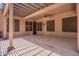 Wide patio with a ceiling fan and pergola at 25633 N 71St Dr, Peoria, AZ 85383