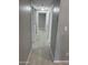 Hallway showcasing the flooring with multiple doorways to rooms at 3104 E Broadway Rd # 348, Mesa, AZ 85203