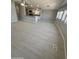 Bright living space with hardwood flooring and easy access to the kitchen at 3104 E Broadway Rd # 348, Mesa, AZ 85203