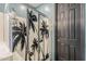 Clean and modern bathroom featuring a shower stall with palm tree accents at 3173 N Clanton St, Buckeye, AZ 85396