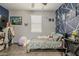 Cozy bedroom with a custom accent wall and playful decor, perfect for a space at 3173 N Clanton St, Buckeye, AZ 85396