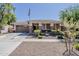 Charming single-story home with neutral colors, front yard, and attached two car garage at 3173 N Clanton St, Buckeye, AZ 85396