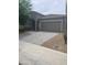 Charming single-story home with a well-maintained front yard and a two-car garage at 3211 W Pollack St, Phoenix, AZ 85041