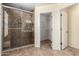 Bathroom features a glass enclosed shower with tile surround at 4043 E Carla Vista Dr, Gilbert, AZ 85295
