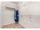 Walk-in closet with built-in shelving and ample storage space at 4043 E Carla Vista Dr, Gilbert, AZ 85295
