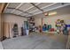 Spacious garage featuring ample storage space for tools, equipment, and vehicles at 4043 E Carla Vista Dr, Gilbert, AZ 85295
