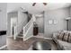 Open-concept layout with living room flowing into staircase, offering a modern and spacious feel at 4043 E Carla Vista Dr, Gilbert, AZ 85295