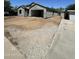 Unfinished exterior with a garage and a modern architectural design at 415 S Robert S Rd, Tempe, AZ 85281