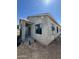 Newly plastered exterior showing windows and progress in home construction at 415 S Robert S Rd, Tempe, AZ 85281