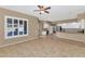 Open-concept kitchen with white cabinetry, granite countertops, and a breakfast bar at 4239 W Reddie Loop, Phoenix, AZ 85083