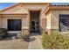 Welcoming front entrance featuring a covered porch and landscaped walkway at 4338 E Hamblin Dr, Phoenix, AZ 85050
