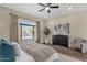 Spacious main bedroom with a large window and decorative accents at 4338 E Hamblin Dr, Phoenix, AZ 85050