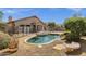 Backyard pool offers a refreshing retreat and includes a safety fence for peace of mind at 4338 E Hamblin Dr, Phoenix, AZ 85050