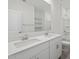 Bright bathroom with double sink vanity and well-lit mirror, blending functionality with modern design at 5573 S 246Th Ave, Buckeye, AZ 85326