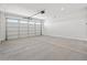 Spacious two car garage, ready for parking and storage at 5573 S 246Th Ave, Buckeye, AZ 85326