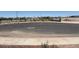 Open street with trees and houses in the background on a clear, sunny day at 5573 S 246Th Ave, Buckeye, AZ 85326
