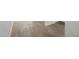 Neutral tone tile floors meet a clean white wall at 5573 S 246Th Ave, Buckeye, AZ 85326