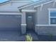 Charming single Gathering home with an attached two car garage and low maintenance landscaping at 5573 S 246Th Ave, Buckeye, AZ 85326