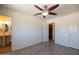 Bright bedroom with bathroom in the doorway at 6012 W Flower St, Phoenix, AZ 85033