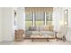Comfortable living room with a neutral color palette, stylish furniture, and a large window with natural light at 667 E Brown Way, San Tan Valley, AZ 85140