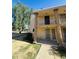 Exterior view of a two-story condo with a balcony and well-maintained landscaping at 7126 N 19Th Ave # 224, Phoenix, AZ 85021
