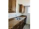 Well-lit kitchen offers ample countertop space and wooden cabinetry at 7126 N 19Th Ave # 224, Phoenix, AZ 85021