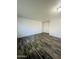 Spacious living room showcases updated flooring and ample natural light at 7126 N 19Th Ave # 224, Phoenix, AZ 85021