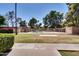 Outdoor community pool with a well-kept lawn, mature trees and landscaping at 7126 N 19Th Ave # 224, Phoenix, AZ 85021