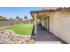This backyard has artifical grass and a pavers as groundcover for a clean, low maintenance look at 7253 S Terrace Rd, Tempe, AZ 85283
