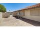 Paver groundcover in backyard with gym equipment and low maintenence landscaping at 7253 S Terrace Rd, Tempe, AZ 85283